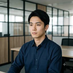佐野 直哉(システム開発チームのエンジニア・入社3年目)